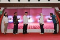 Caption. Bupati Malang H.M Sanusi (tengah) saat Launching E Parkir kawasan wisata milik PD Jasa Yasa 