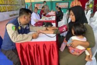 Foto : Bulan Bakti TNI-Polri, Polres Malang menggelar kegiatan pengobatan gratis 