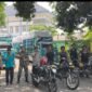 Foto  Anggota Polres Pasuruan Kota aktif terlibat dalam kegiatan pengamanan dan pengawalan penarikan kotak suara Pemilu 2024