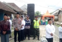 Foto : Bhabinkabtimas Polsek Tumpang saat menghadiri pengajian umum di Desa Tulusbesar Kecamatan Tumpang