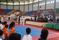 Caption. Pembukaan kejuaraan Karateka Jatim Open piala Kemenpora 2024 dibuka oleh Wakil Bupati Malang Didik Gatot Subroto di GOR Kanjuruhan Kepanjen Malang 