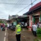 Foto : Personel Polsek Tumpang ikut amankan kelancaran jalan pada pawai Ta'aruf yang digelar - TK Muslimat NU 3 Plus Annur Tumpang 