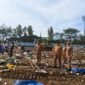 Foto : Sekretaris Daerah Kota Batu, Zadim Effisiensi, memimpin langsung proses pembersihan area dalam Stadion Gelora Brantas 