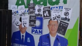Foto : Poster provokasi yang ditempel di benaner paslon ABADI