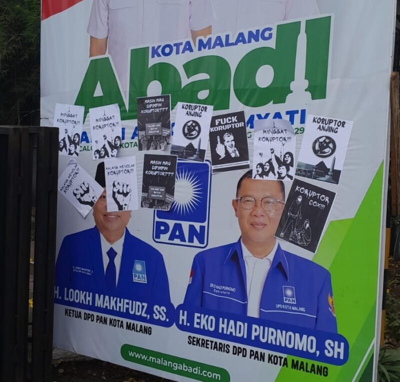 Foto : Poster provokasi yang ditempel di benaner paslon ABADI