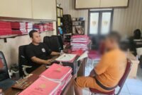 Fs (baju Orange) saat di periksa Penyidik Satreskrim Polres Malang

Dok Humas Polres Malang