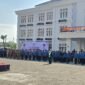 Keterangan Foto : Upacara khidmat peringatan Hari Jadi Kabupaten Pasuruan ke-1096 digelar di halaman Perkantoran Raci, Bangil, Kamis (18/9/2025). 