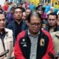 Ket foto. Deputi III Bidang Penganekaragaman Konsumsi dan Keamanan Pangan Bapanas, Andriko Noto Susanto didampingi Satgas Pangan Provinsi Jatim dan Kabupaten Malang saat ditemui awak media usai mengecek HET beras di pasar tradisional dan pasar modern di Singosari 