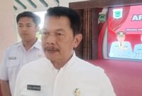 Ket foto. Plt Kepala Dinas Komunikasi dan Informatika Kabupaten Malang, Drs Atsalis Supriyanto saat ditemui awak media