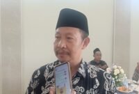 Ket foto. Kepala SMP An-Nur Bululawang, H. Nur Kholis, M.Pd.I., saat diwawancara awak media