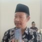 Ket foto. Kepala SMP An-Nur Bululawang, H. Nur Kholis, M.Pd.I., saat diwawancara awak media 