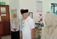 Ket foto. Bupati Malang, HM Sanusi saat sidak ruang pelayanan di Puskesmas Tajinan 