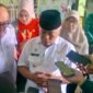 Ket foto. Bupati Malang, HM Sanusi saat diwawancara awak media di Puskesmas Tajinan 