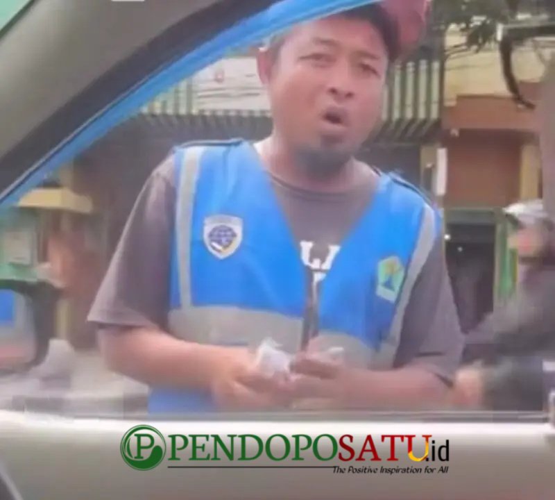 Oknum jukir Kayutangan kota Malang (Foto: bgs Pendoposatu.id)
