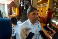 Ket foto. Ketua GAPEMBI Malang raya, Djoni Sudjatmiko saat diwawancara awak media usai rapat kerja anggota GAPEMBI 