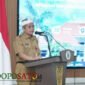 Kepala Bakorwil Malang, Asep Kusdinar, Memberikan Sambutan Diskusi Ketenagakerjaan (Foto: Seno Pendoposatu)