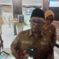 Bupati Blitar, Rijanto Saat Dikonfirmasi Awak Media Usai Didatangi Tim KPK di Kantornya (Foto: Soni Pendoposatu)