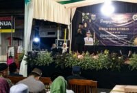 Ket foto. Kepala Desa Sitirejo Kecamatan Wagir, Buang Suharja,  saat memberikan sambutan di pengajian dalam rangka Bersih Desa Sitirejo 2026