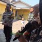 Koordinator Warga, Lusi Saat Demo Di SPPG Sukoharjo 1 Di Kelurahan Sukoharjo, Kecamatan Klojen, Kota Malang (Foto: bgs Pendoposatu)