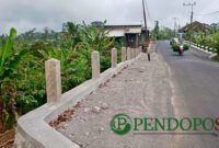 Pembangunan Dinding Penahan Tanah (DPT) Tangsi - Sipelot Kecamatan Tirtoyudo Oleh DPUBM Kabupaten Malang (Foto: Seno Pendoposatu)