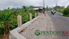 Pembangunan Dinding Penahan Tanah (DPT) Tangsi - Sipelot Kecamatan Tirtoyudo Oleh DPUBM Kabupaten Malang (Foto: Seno Pendoposatu)