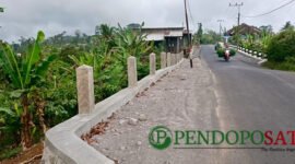 Pembangunan Dinding Penahan Tanah (DPT) Tangsi - Sipelot Kecamatan Tirtoyudo Oleh DPUBM Kabupaten Malang (Foto: Seno Pendoposatu)