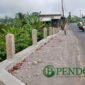 Pembangunan Dinding Penahan Tanah (DPT) Tangsi - Sipelot Kecamatan Tirtoyudo Oleh DPUBM Kabupaten Malang (Foto: Seno Pendoposatu)