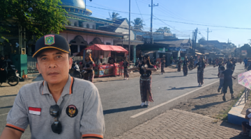 Kepala Desa Sidorejo, M. Hery Junaedi (insert) Kecamatan Pagelaran Kabupaten Malang, Saat Kiirab Berlangsung (Foto: Seno Pendoposatu)