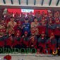 Bupati Malang, HM Sanusi di dampingi Ketua Kwarcab Gerakan Pramuka foto bersama dengan 34 anggota Pramuka sebelum berangkat ke bumi perkemahan Cibubur (Foto: Seno pendoposatu.id)