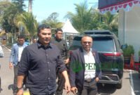 Abdul Qadir didampingi Lawyernya, Agustian Siagian, S.H saat mendatangi Polres Malang (Foto: bgs pendoposatu.id)
