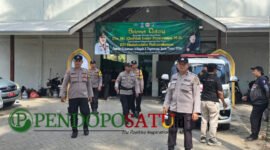 Anggota Polsek Muncar terlihat berjaga pada acar Kejuaraan Wilayah (Kejurwil) X Pagar Nusa Provinsi Jatim (Foto: Boby pendoposatu.id)