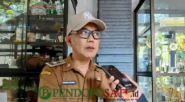 Kepala Dinas Pekerjaan Umum Bina Marga (DPUBM) Kabupaten Malang, Khairul Isnaidi Kusuma saat dikonfirmasi oleh wartawan (Foto: bgs pendoposatu.id)