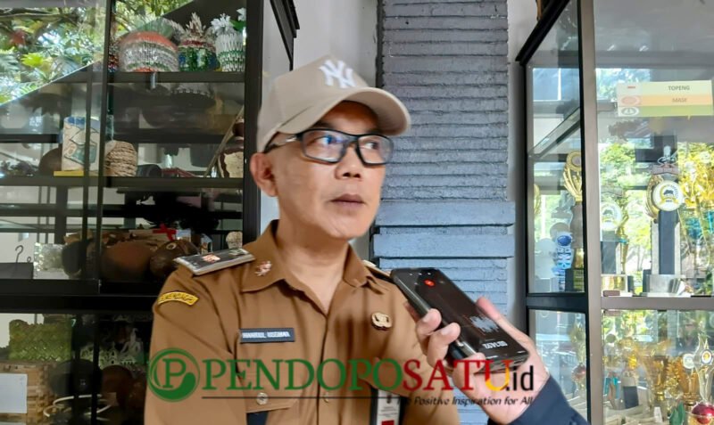Kepala Dinas Pekerjaan Umum Bina Marga (DPUBM) Kabupaten Malang, Khairul Isnaidi Kusuma saat dikonfirmasi oleh wartawan (Foto: bgs pendoposatu.id)