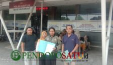 Bupati Lira Pasuruan, Muslimin dan Kuasa Hukum, Heri Siswanto, S.H, M.H (kanan) saat mendampingi korban pelaporan ke Polres Pasuruan (Foto: Abdullah pendoposatu.id)