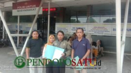 Bupati Lira Pasuruan, Muslimin dan Kuasa Hukum, Heri Siswanto, S.H, M.H (kanan) saat mendampingi korban pelaporan ke Polres Pasuruan (Foto: Abdullah pendoposatu.id)
