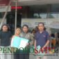 Bupati Lira Pasuruan, Muslimin dan Kuasa Hukum, Heri Siswanto, S.H, M.H (kanan) saat mendampingi korban pelaporan ke Polres Pasuruan (Foto: Abdullah pendoposatu.id)